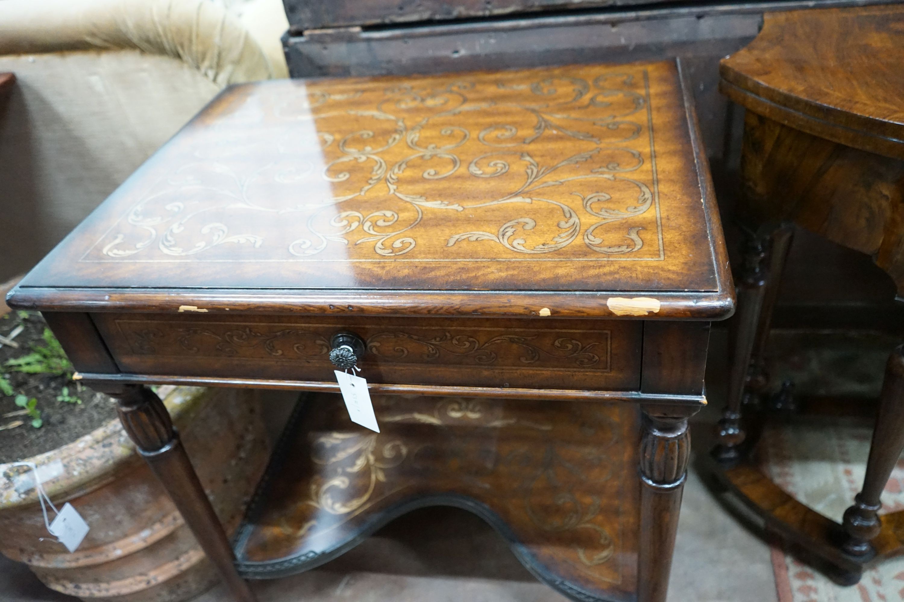 A Theodore Alexander Italian style parcel gilt walnut side table, width 66cm, depth 51cm, height 72cm